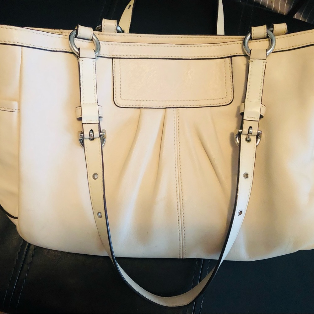 White leather, Authentic Coach bag. Excellent pre-owned condition.